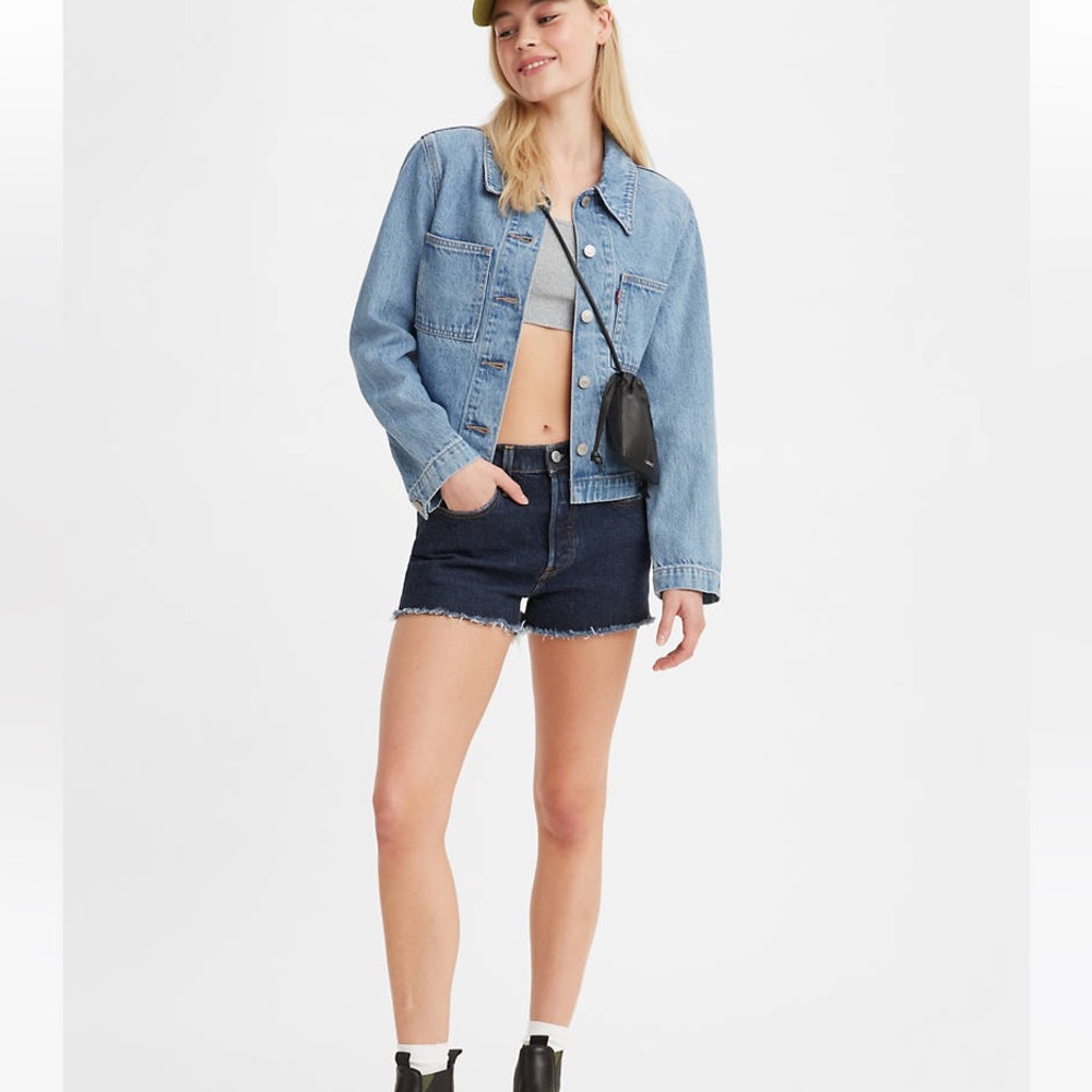 LEVI’S 501 high waisted dark wash raw hem cut off shorts